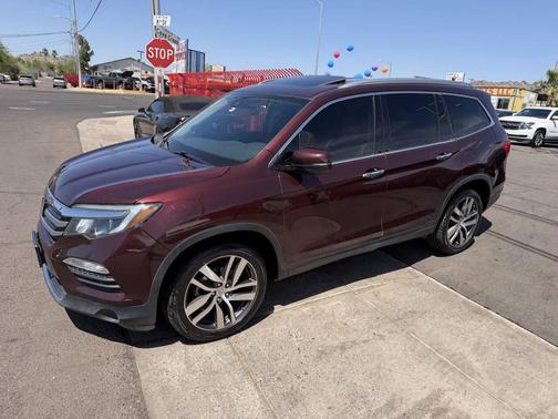 Red 2016 Honda Pilot Touring