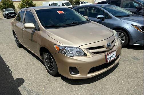 Sandy Beach Metallic 2011 Toyota Corolla LE