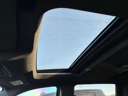 Volcanic Red Tintcoat 2025 GMC Sierra 1500 AT4