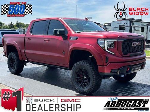 Volcanic Red Tintcoat 2026 GMC Sierra 1500 AT4