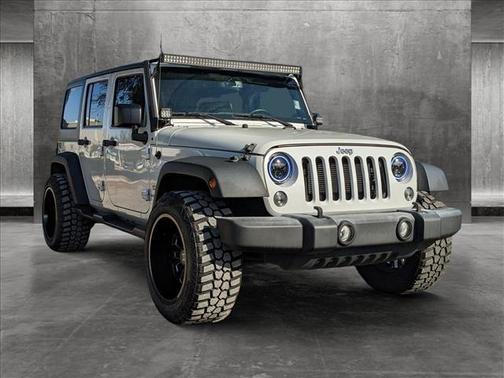 Photo 2 of 4 of 2017 Jeep Wrangler Unlimited Sport