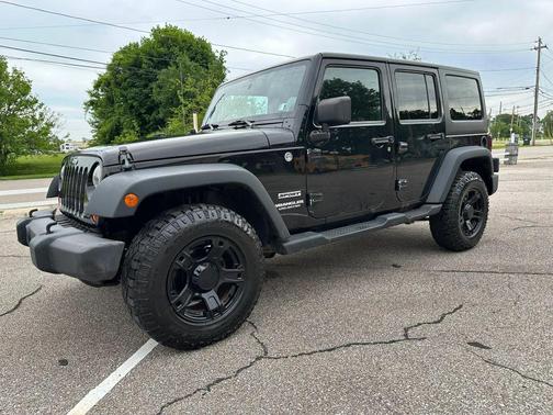 Black 2013 Jeep Wrangler Unlimited Sport