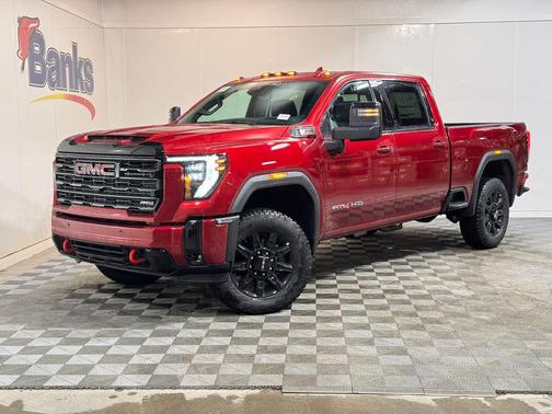 Volcanic Red Tintcoat 2026 GMC Sierra 2500 AT4