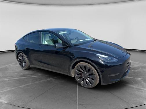 Solid Black 2024 Tesla Model Y Performance