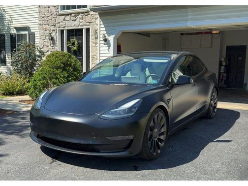Solid Black 2023 Tesla Model 3 Performance