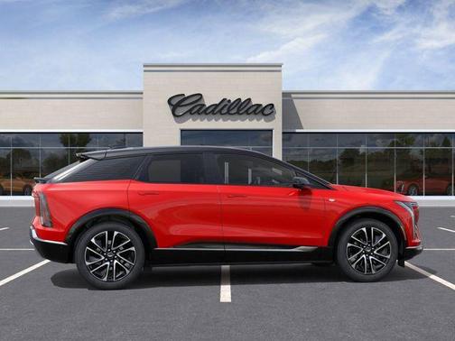 Orange 2026 Cadillac OPTIQ Premium Sport