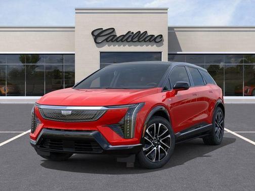 Orange 2026 Cadillac OPTIQ Premium Sport