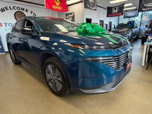 Aurora Blue Pearl Metallic/Super Black 2025 Nissan Murano SL
