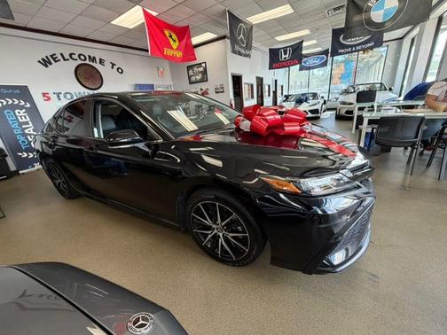 Midnight Black Metallic 2024 Toyota Camry Hybrid SE