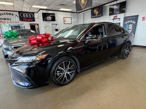 Midnight Black Metallic 2024 Toyota Camry Hybrid SE