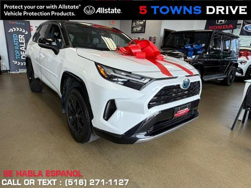 Wind Chill Pearl/Midnight Black Metallic 2023 Toyota RAV4 Hybrid SE