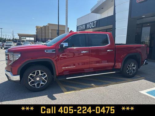 Volcanic Red Tintcoat 2026 GMC Sierra 1500 SLT