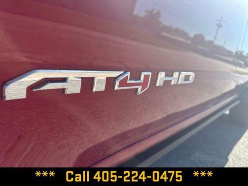 Volcanic Red Tintcoat 2026 GMC Sierra 2500 AT4