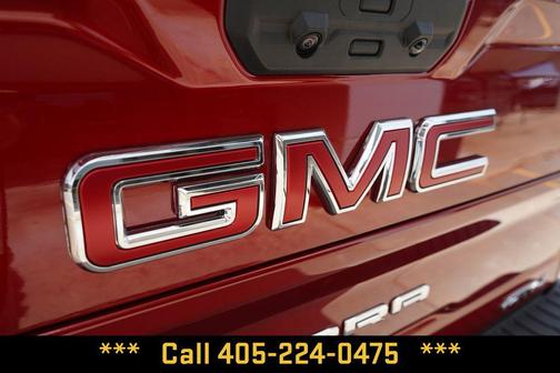 Volcanic Red Tintcoat 2026 GMC Sierra 2500 AT4