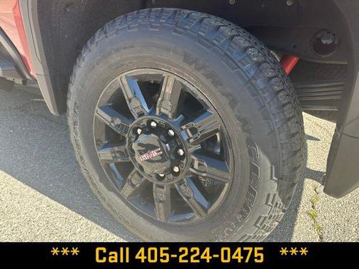 Volcanic Red Tintcoat 2026 GMC Sierra 2500 AT4