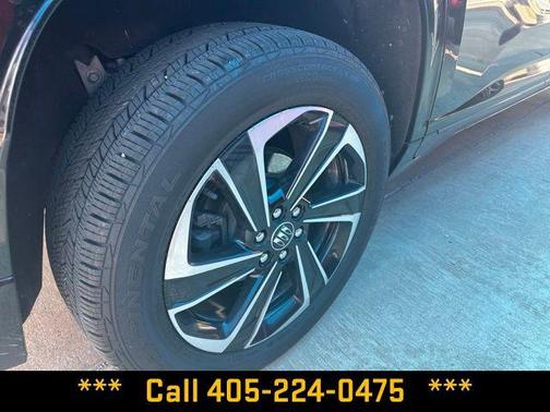 Ebony Twilight Metallic 2025 Buick Enclave Sport Touring