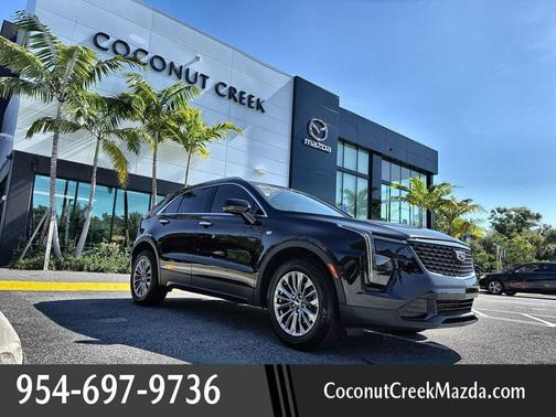 Stellar Black Metallic 2024 Cadillac XT4 Premium Luxury