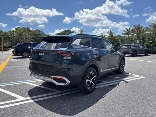Blue 2024 Kia Sportage Hybrid EX