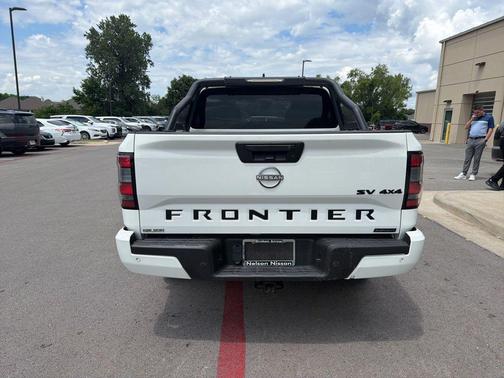 Glacier White 2023 Nissan Frontier SV