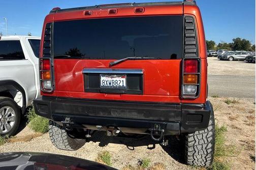 Sunset Orange Metallic 2003 Hummer H2