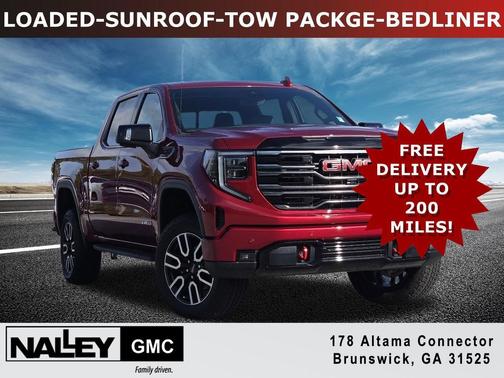Volcanic Red Tintcoat 2026 GMC Sierra 1500 AT4