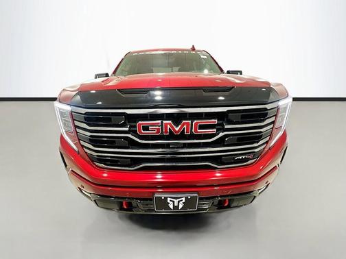Volcanic Red Tintcoat 2026 GMC Sierra 1500 AT4