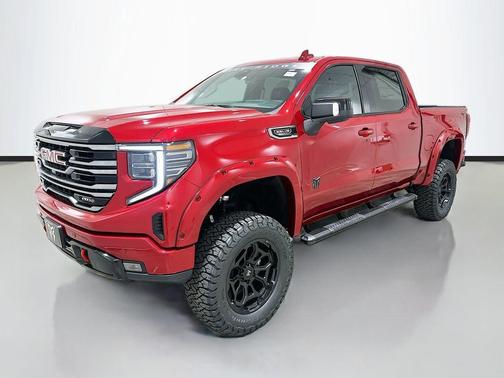 Volcanic Red Tintcoat 2026 GMC Sierra 1500 AT4