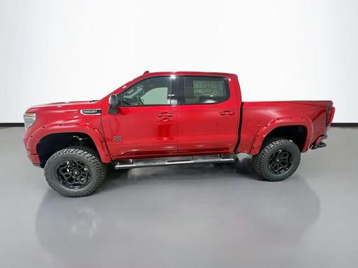 Volcanic Red Tintcoat 2026 GMC Sierra 1500 AT4