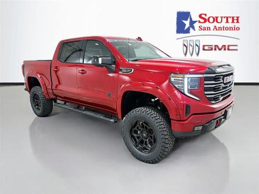 Volcanic Red Tintcoat 2026 GMC Sierra 1500 AT4