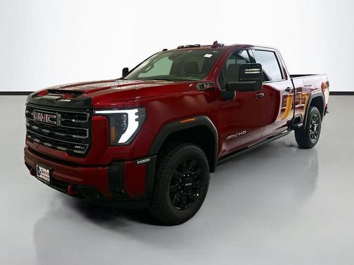 Volcanic Red Tintcoat 2026 GMC Sierra 2500 AT4