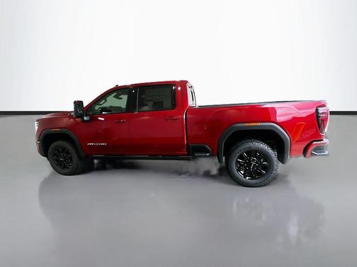 Volcanic Red Tintcoat 2026 GMC Sierra 2500 AT4