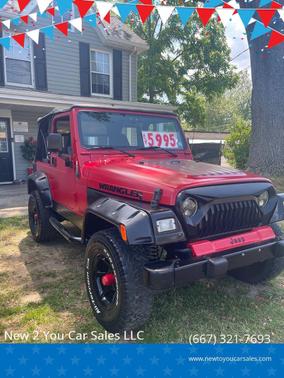 Flame Red 1998 Jeep Wrangler SE