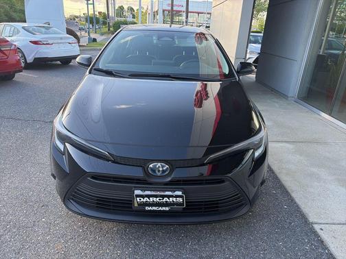 Midnight Black Metallic 2024 Toyota Corolla Hybrid LE