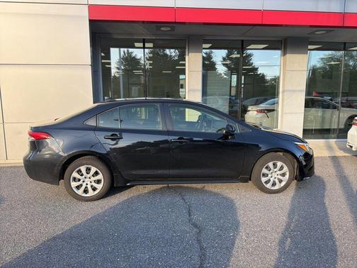 Midnight Black Metallic 2024 Toyota Corolla Hybrid LE