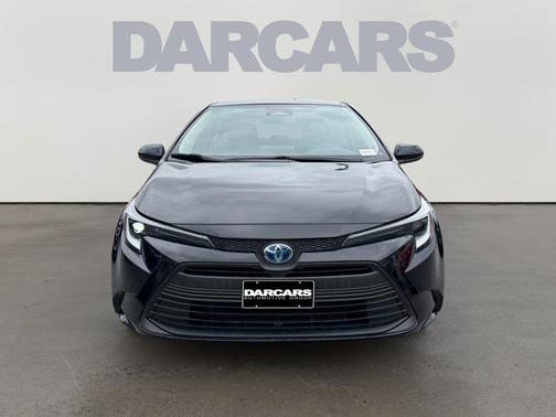 Midnight Black Metallic 2024 Toyota Corolla Hybrid LE