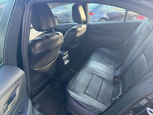 Midnight Black Metallic 2024 Toyota Corolla Hybrid LE
