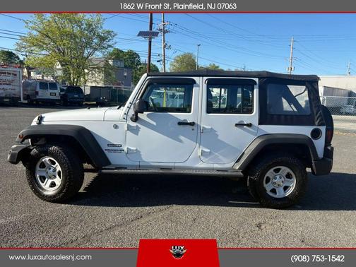 White 2014 Jeep Wrangler Unlimited Sport