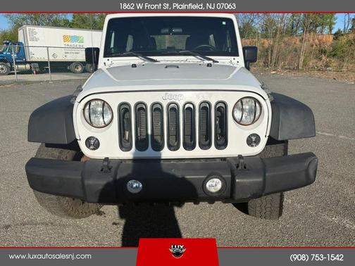 White 2014 Jeep Wrangler Unlimited Sport