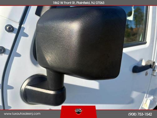 White 2014 Jeep Wrangler Unlimited Sport