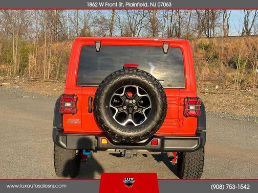 Orange 2023 Jeep Wrangler 4xe Sport S