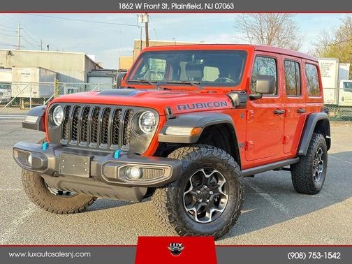 Orange 2023 Jeep Wrangler 4xe Sport S