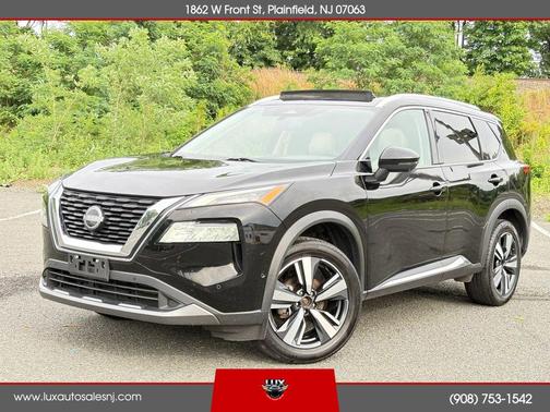blue 2023 Nissan Rogue SL