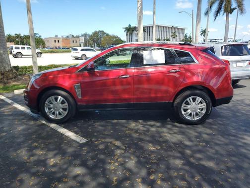 Crystal Red Tintcoat 2016 Cadillac SRX Luxury Collection