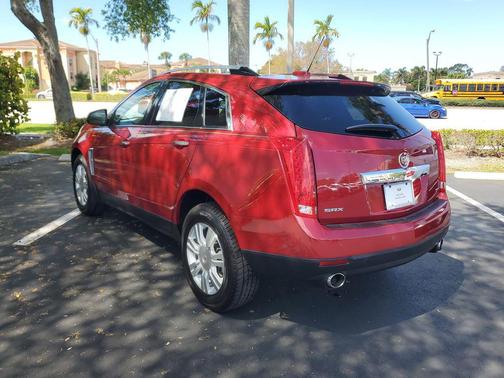 Crystal Red Tintcoat 2016 Cadillac SRX Luxury Collection