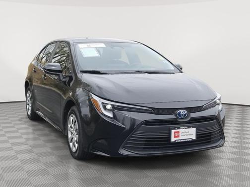Midnight Black Metallic 2025 Toyota Corolla Hybrid LE Sedan