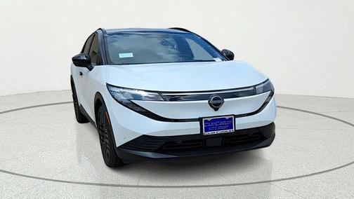 Everest White Pearl Tricoat/Black 2026 Nissan Leaf PLATINUM+