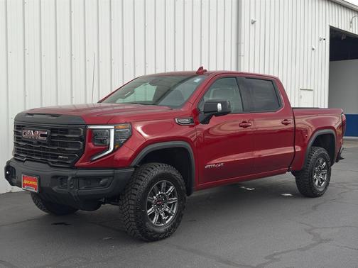 Volcanic Red Tintcoat 2026 GMC Sierra 1500 AT4X