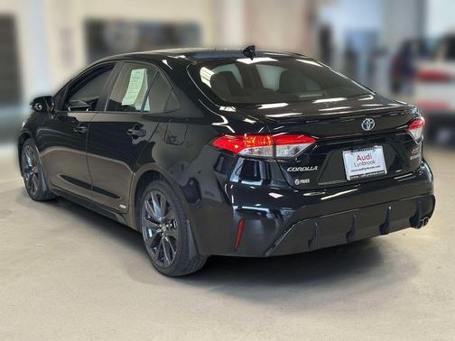 Midnight Black Metallic 2023 Toyota Corolla Hybrid SE