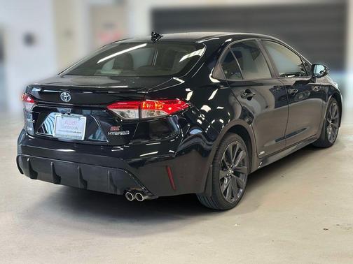 Midnight Black Metallic 2023 Toyota Corolla Hybrid SE
