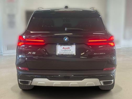 Black Sapphire Metallic 2024 BMW X5 PHEV xDrive50e